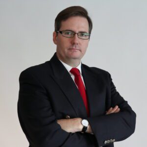 Headshot of Anthony Jones, founder of qx Actuarial and Risk Consultants